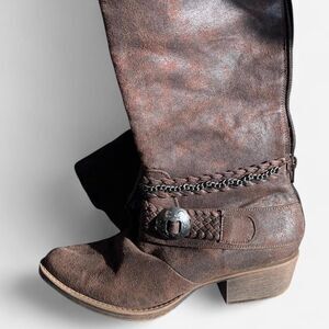 Brown faux leather calf boots with braided details and silver buckle
